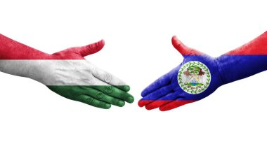 Belize ve Macaristan bayrakları arasındaki el sıkışma, izole şeffaf görüntü.