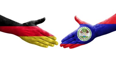 Belize ve Almanya arasındaki el sıkışma ellerinde bayraklar, izole edilmiş şeffaf görüntü.