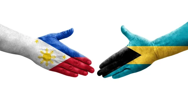 Uścisk Dłoni Między Bahamami Filipinami Flagi Malowane Rękach Odizolowany Przezroczysty — Zdjęcie stockowe