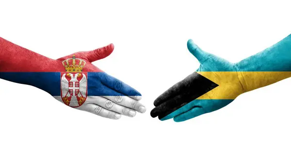 Рукостискання Між Багамськими Сербськими Прапорами Намальоване Руках Ізольоване Прозоре Зображення — стокове фото