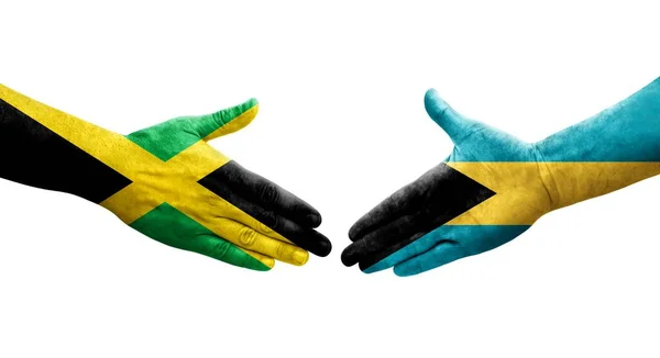 Stretta Mano Tra Bahamas Bandiere Giamaicane Dipinte Mani Immagine Isolata — Foto Stock