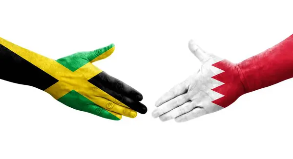 Рукопожатие Между Флагом Бахрейна Ямайки Нарисованное Руках Изолированное Прозрачное Изображение — стоковое фото