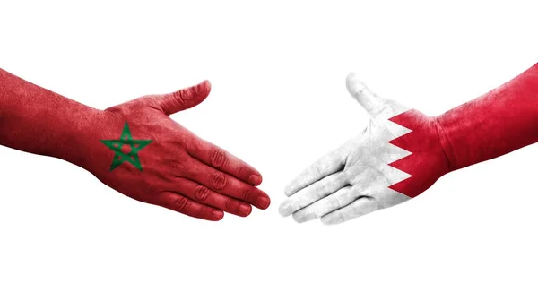 Χειραψία Μεταξύ Μπαχρέιν Και Μαρόκου Σημαίες Ζωγραφισμένα Στα Χέρια Απομονωμένη — Φωτογραφία Αρχείου