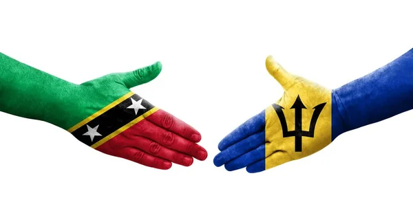 Рукопожатие Между Флагами Барбадоса Сент Китса Невиса Нарисованное Руках Изолированное — стоковое фото