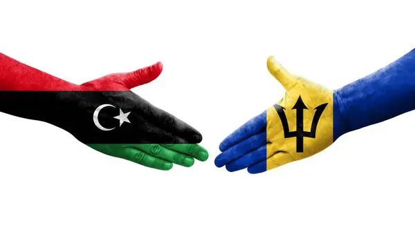 Ellerinde Barbados Libya Bayrakları Arasında Sıkışma Izole Şeffaf Görüntü — Stok fotoğraf