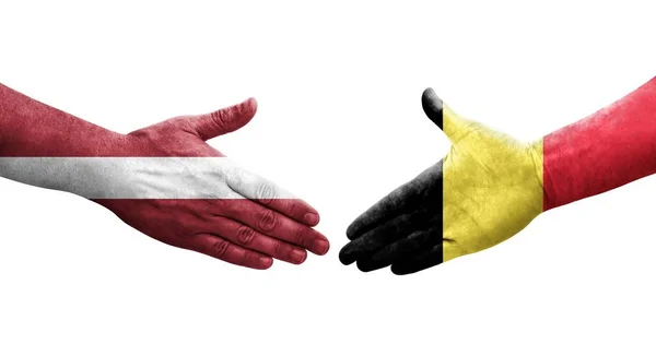 Aperto Mão Entre Bélgica Letónia Bandeiras Pintadas Mãos Imagem Transparente — Fotografia de Stock