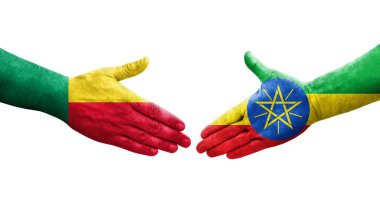 Benin ve Etiyopya bayrakları arasındaki tokalaşma elleri boyalı, izole şeffaf görüntü.