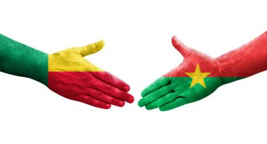 Benin ve Burkina Faso bayrakları arasındaki tokalaşma elleri boyalı, izole şeffaf görüntü.