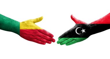 Benin ve Libya bayrakları arasındaki el sıkışma, izole edilmiş şeffaf görüntü.