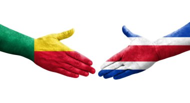 Benin ve Kosta Rika bayrakları arasında el sıkışma, izole şeffaf görüntü.