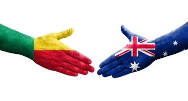 Benin ve Avustralya bayrakları arasındaki el sıkışma ellere boyanmış, izole şeffaf görüntü.