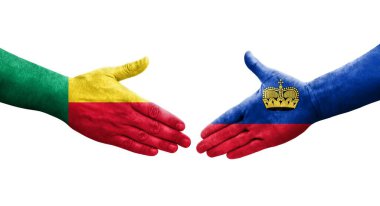 Benin ve Lihtenştayn bayrakları arasında el sıkışma, izole şeffaf görüntü.