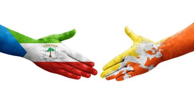 Bhutan ve Ekvator Gine bayrakları arasındaki el sıkışma, izole şeffaf görüntü.