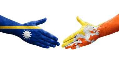 Bhutan ve Nauru bayrakları arasındaki tokalaşma ellerinde, izole şeffaf görüntü.