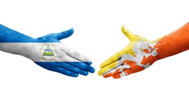 Bhutan ve Nikaragua bayrakları arasındaki el sıkışma, izole şeffaf görüntü.
