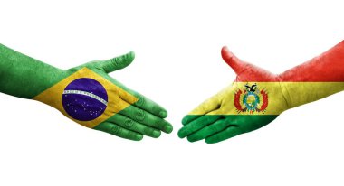 Ellerinde Bolivya ve Brezilya bayrakları arasında el sıkışma, izole şeffaf görüntü.