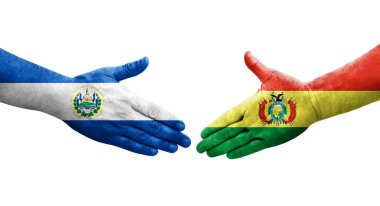 Bolivya ve El Salvador bayrakları arasındaki el sıkışma ellerinde izole şeffaf görüntü.
