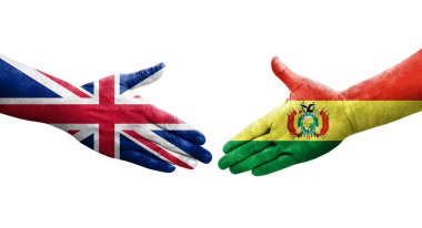 Ellerinde bolivya ve Birleşik Krallık bayrakları arasında el sıkışma, izole şeffaf görüntü.