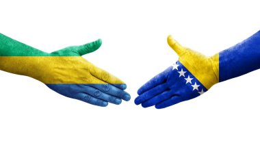Bosna ve Gabon bayrakları arasında el sıkışma, izole şeffaf görüntü.