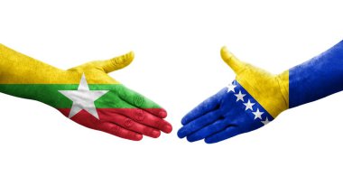 Bosna ve Myanmar bayrakları arasında el sıkışma, izole şeffaf görüntü.