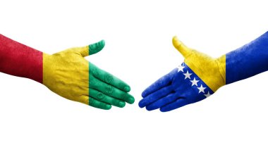 Bosna ve Gine bayrakları arasında el sıkışma, izole şeffaf görüntü.