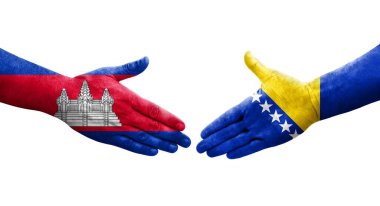 Bosna ve Kamboçya bayrakları arasında el sıkışma, izole şeffaf görüntü.