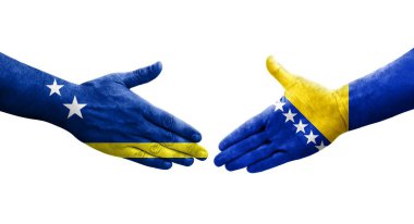 Bosna ve Curacao bayrakları arasındaki el sıkışma ellerinde resmedilmiş şeffaf bir görüntü.