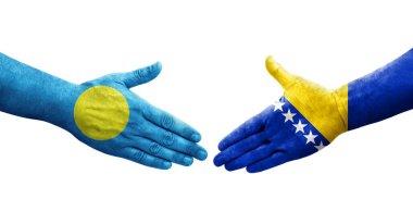 Bosna ve Palau bayrakları arasındaki el sıkışma, izole edilmiş şeffaf görüntü.