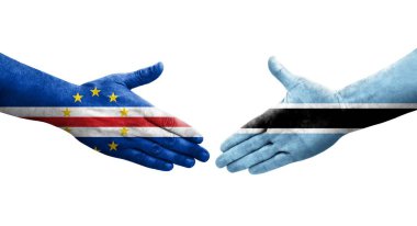 Botswana ve Cape Verde bayrakları arasındaki tokalaşma elleri boyalı, izole şeffaf görüntü.