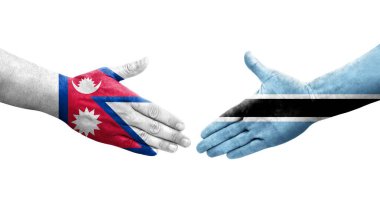 Ellerinde Botswana ve Nepal bayrakları arasında el sıkışma, izole şeffaf görüntü.