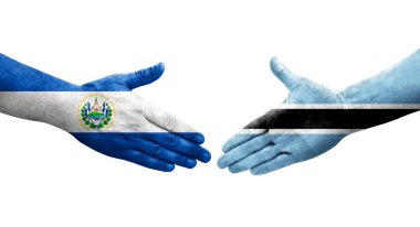 Botswana ve El Salvador bayrakları arasındaki tokalaşma elleri boyalı, izole şeffaf görüntü.