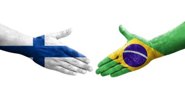 Brezilya ve Finlandiya bayrakları arasında el sıkışma, izole şeffaf görüntü.