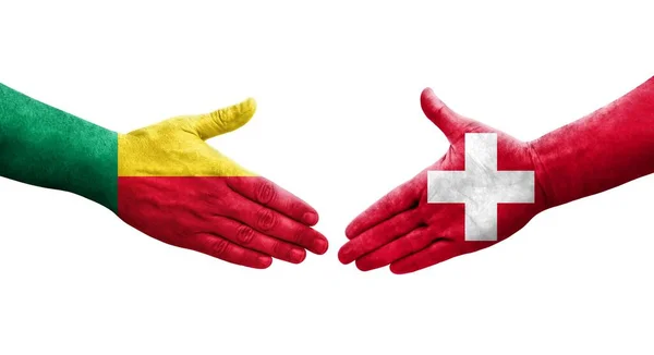 Uścisk Dłoni Między Beninem Szwajcarią Flagi Malowane Rękach Odizolowany Przezroczysty — Zdjęcie stockowe