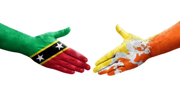 Håndtrykk Mellom Bhutan Saint Kitts Nevis Flagg Malt Hender Isolert – stockfoto