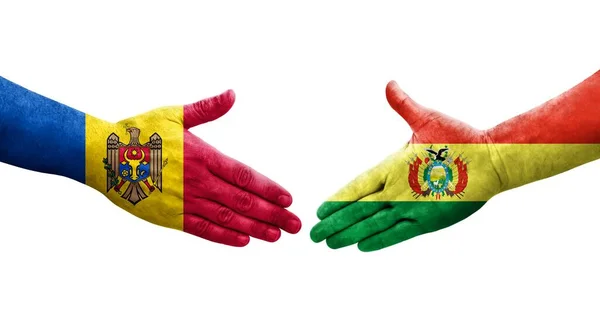 stock image Handshake between Bolivia and Moldova flags painted on hands, isolated transparent image.