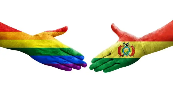 Handdruk Tussen Bolivia Lgbt Vlaggen Geschilderd Handen Geïsoleerd Transparant Beeld — Stockfoto