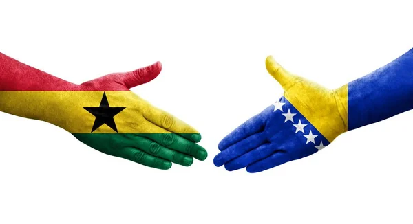 Handdruk Tussen Bosnië Ghana Vlaggen Geschilderd Handen Geïsoleerd Transparant Beeld — Stockfoto