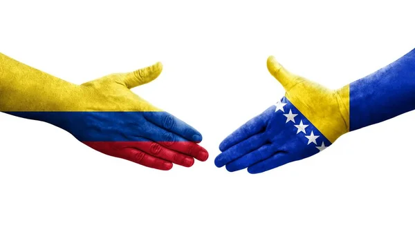 Handslag Mellan Bosnien Och Colombia Flaggor Målade Händer Isolerad Transparent — Stockfoto