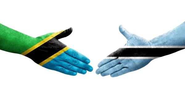 Aperto Mão Entre Botsuana Bandeiras Tanzânia Pintadas Mãos Imagem Transparente — Fotografia de Stock