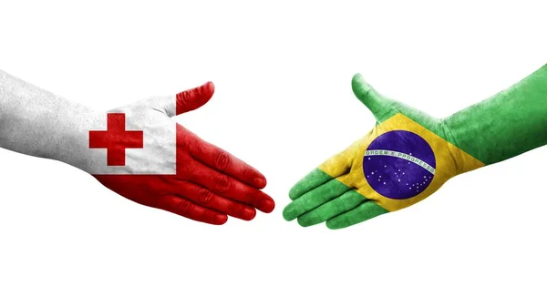 Apretón Manos Entre Brasil Tonga Banderas Pintadas Las Manos Imagen —  Fotos de Stock