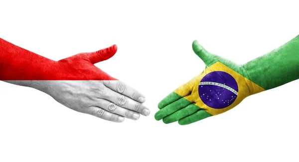 Apretón Manos Entre Brasil Indonesia Banderas Pintadas Las Manos Imagen — Foto de Stock