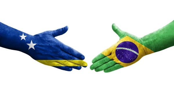 Apretón Manos Entre Brasil Curazao Banderas Pintadas Las Manos Imagen — Foto de Stock