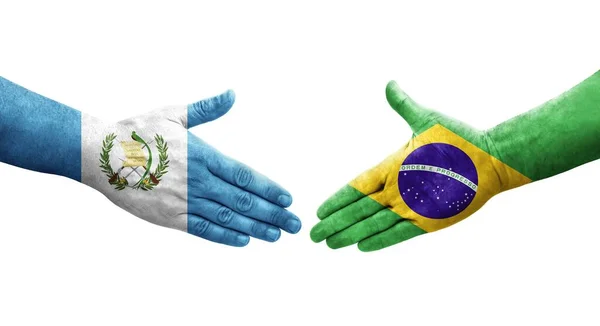 Apretón Manos Entre Brasil Guatemala Banderas Pintadas Las Manos Imagen — Foto de Stock