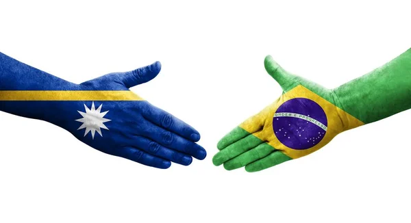 手描きのブラジルとナウルの旗の間の握手 隔離された透明画像 — ストック写真