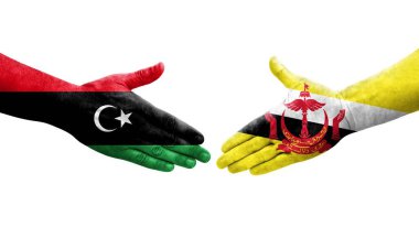 Brunei ve Libya bayrakları arasındaki el sıkışma, izole edilmiş şeffaf görüntü.