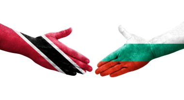 Bulgaristan ile Trinidad Tobago bayrakları arasındaki el sıkışma, izole şeffaf görüntü.