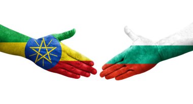 Bulgaristan ile Etiyopya bayrakları arasındaki el sıkışma, izole edilmiş şeffaf görüntü.