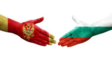 Bulgaristan ile Karadağ arasındaki el sıkışma, elde boyanmış bayraklar, izole edilmiş şeffaf görüntü.
