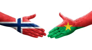 Ellerinde Burkina Faso ve Norveç bayrakları arasında el sıkışma, izole şeffaf görüntü.