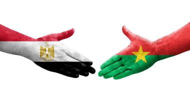 Burkina Faso ve Mısır bayrakları arasındaki tokalaşma elleri boyalı, izole şeffaf görüntü.